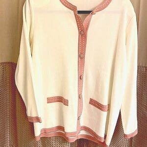 Beautiful pink and cream sweater jacket size L buttons down in front.